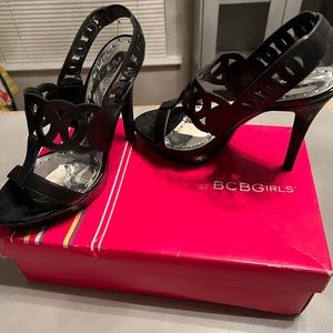 Bcbg girls black leather heels with patent leather.   Used.